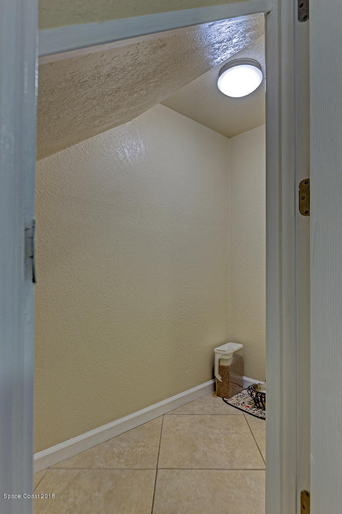 2775 Reston Street, Unit 106 Melbourne, FL 32935 - Photo 14 of 21 Storage Space Underneath Stair Case