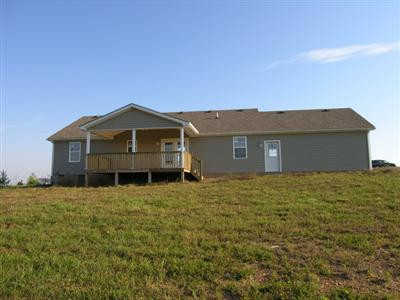 203 Ridgecrest Road Lancaster, KY 40444 - Photo 9 of 10 Really nice covered rear deck with a cat