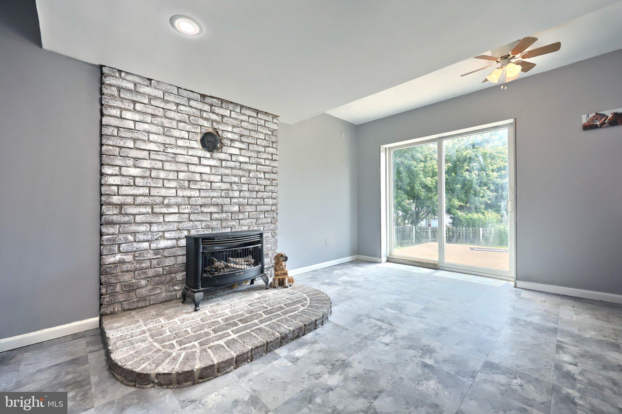 3116 Grandview Road Hanover, PA 17331 - Photo 22 of 35 Modern space with cozy fireplace charm.