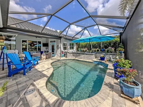 an outdoor space with seating area and furniture