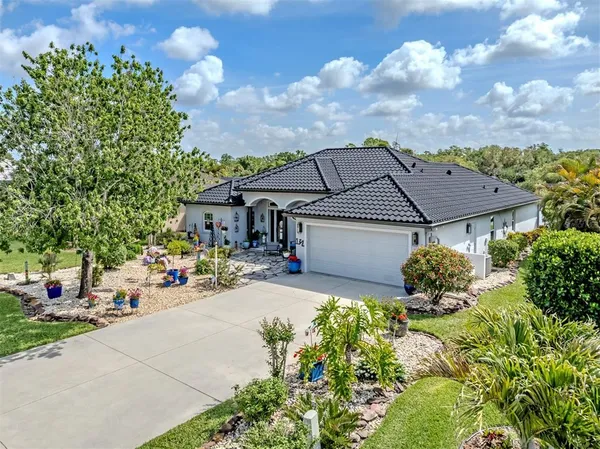 a house view with a garden space