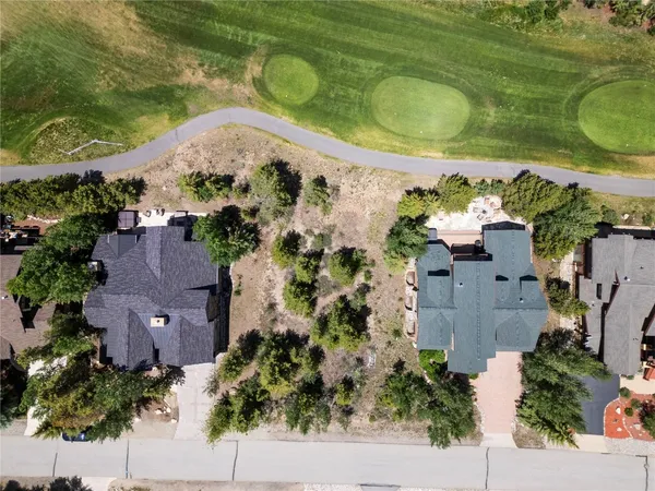an aerial view of a house with a garden