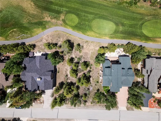 an aerial view of a house with a garden