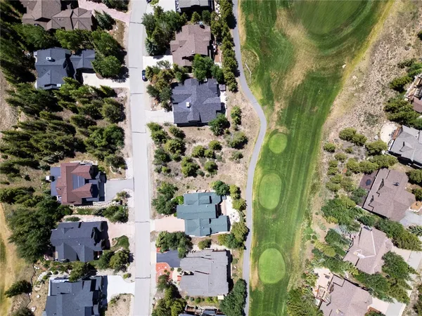 an aerial view of a houses with outdoor space