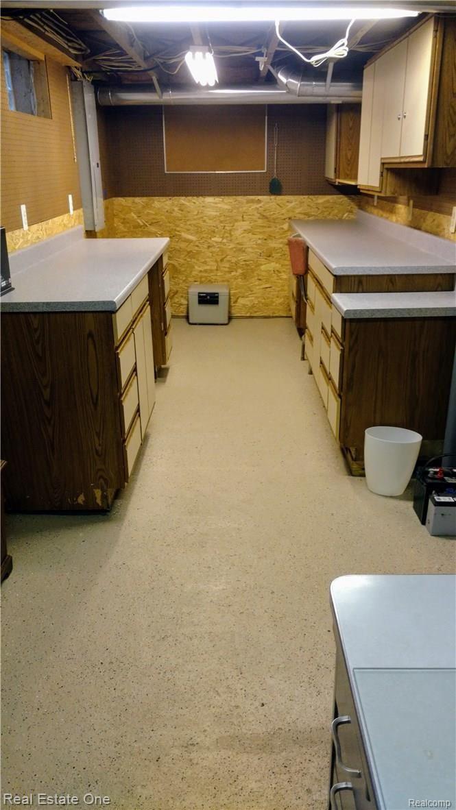 3249 Wakefield Road Berkley, MI 48072 - Photo 37 of 44 Craft room with built-in cabinets & tops
