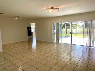 22175 General Street Boca Raton, FL 33428 - Photo 16 of 32 an empty room with natural light