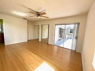 22175 General Street Boca Raton, FL 33428 - Photo 19 of 32 a view of empty room with wooden floor