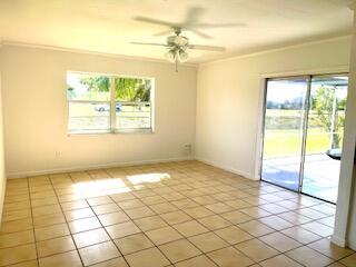 22175 General Street Boca Raton, FL 33428 - Photo 7 of 32 a view of an empty room and window