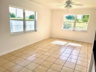 22175 General Street Boca Raton, FL 33428 - Photo 8 of 32 a view of an empty room and window