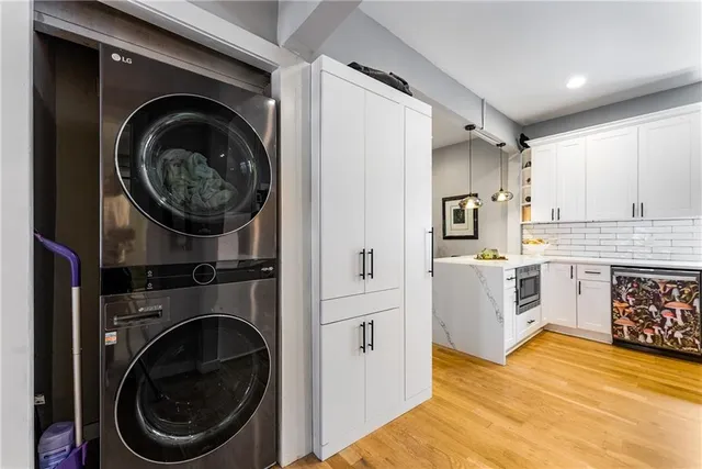 a view of a kitchen with washer and dryer