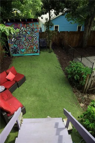 a garden view with a seating space