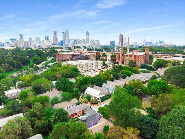 a view of a city with tall buildings