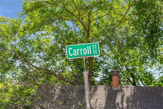 a street sign on a pole on a street
