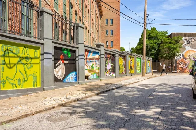 a view of a building with a street