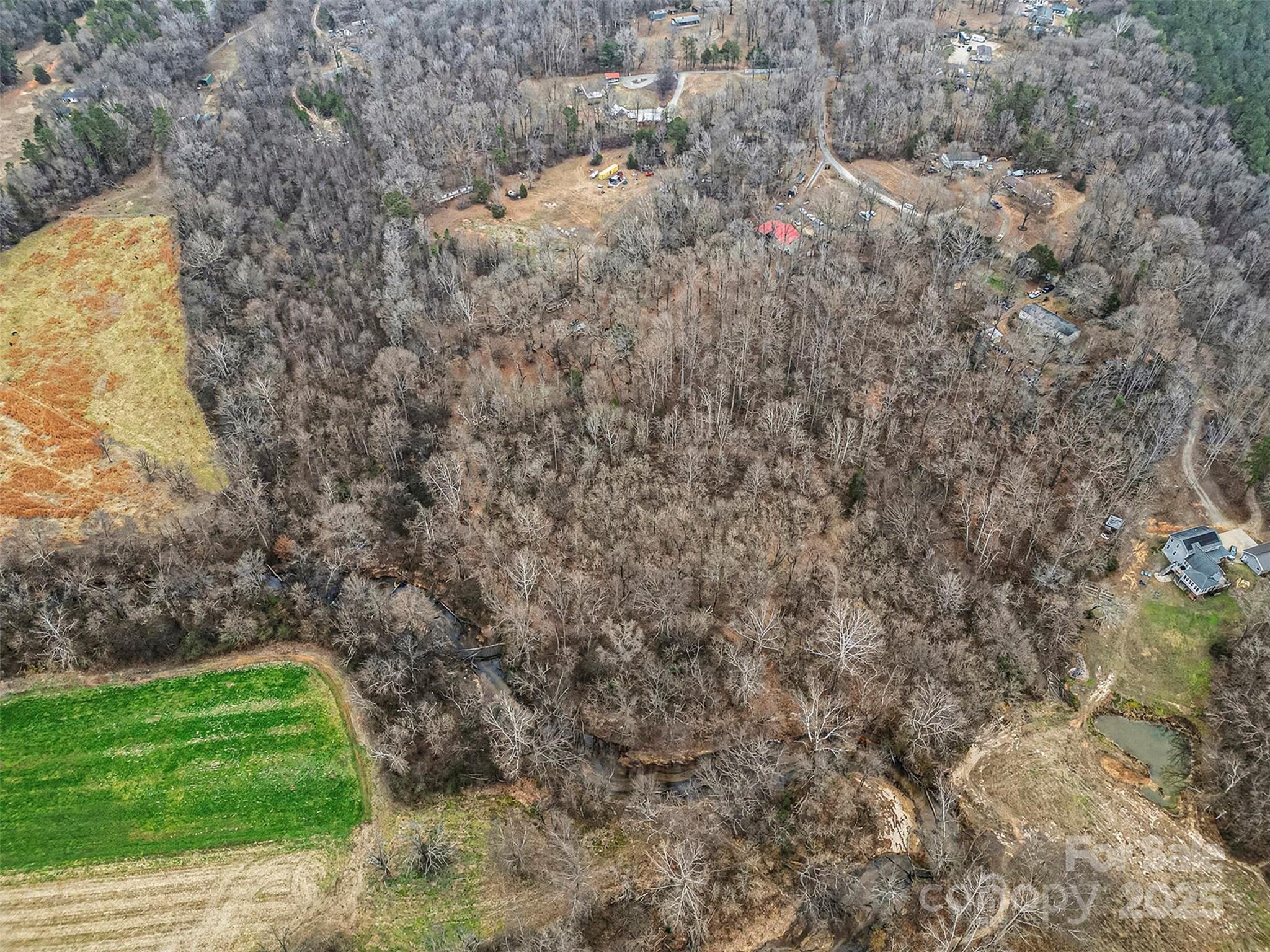 0 Rock Hollar Road Stanley, NC 28164 - Photo 12 of 18 a view of a yard with a trees