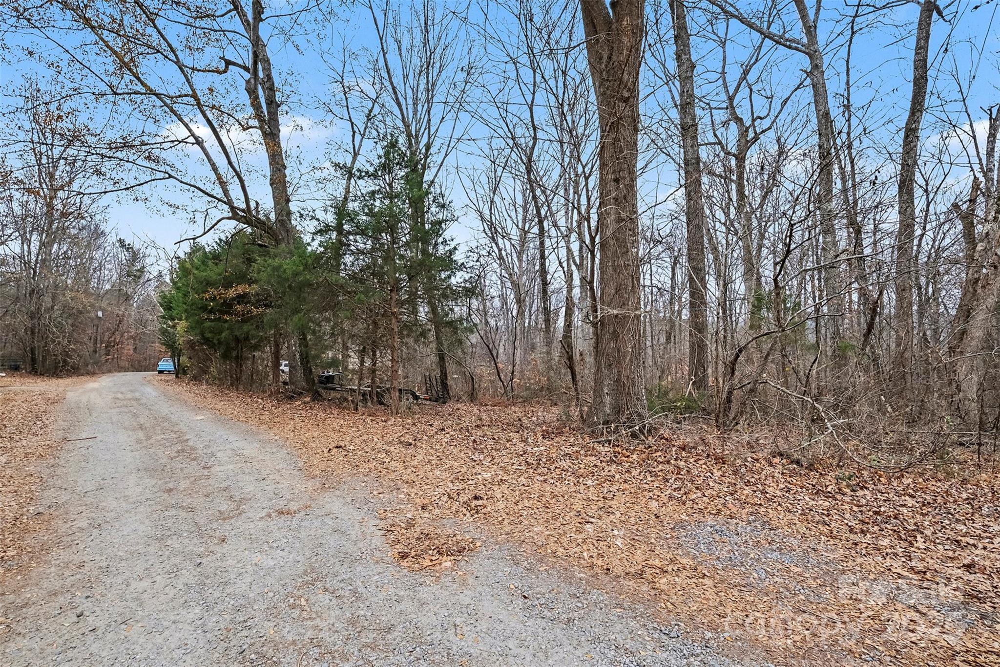 0 Rock Hollar Road Stanley, NC 28164 - Photo 3 of 18 a backyard of a house with lots of green space