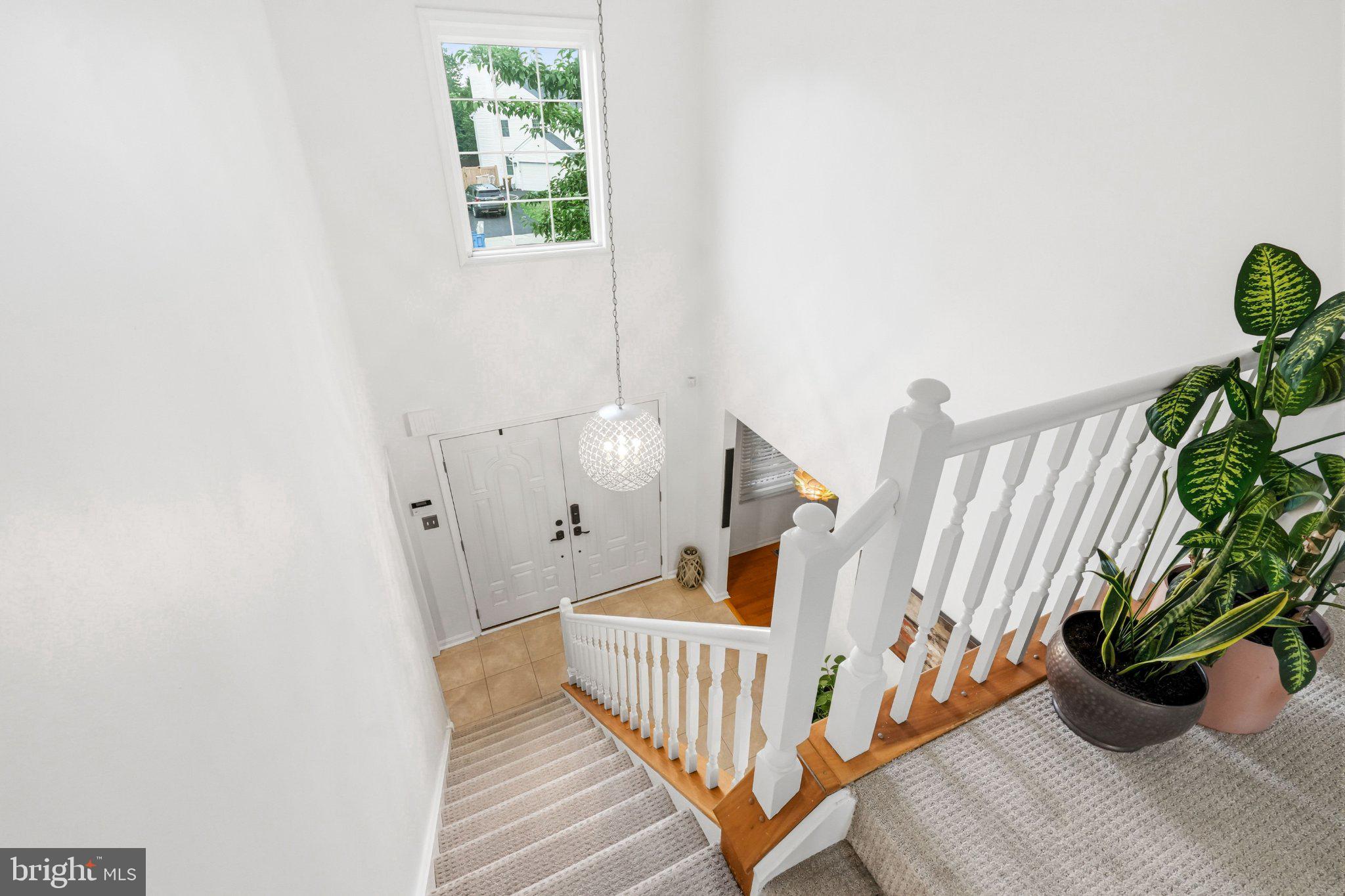 2134 West Wellington Road Newtown, PA 18940 - Photo 31 of 42 Inviting staircase with natural light.