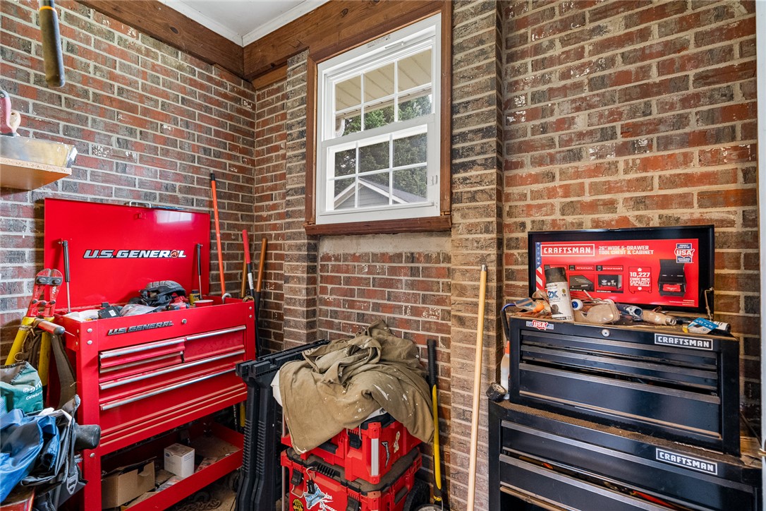 4508 Old Williamston Road Belton, SC 29627 - Photo 26 of 47 The garage features an additional storage space for mower or tools!