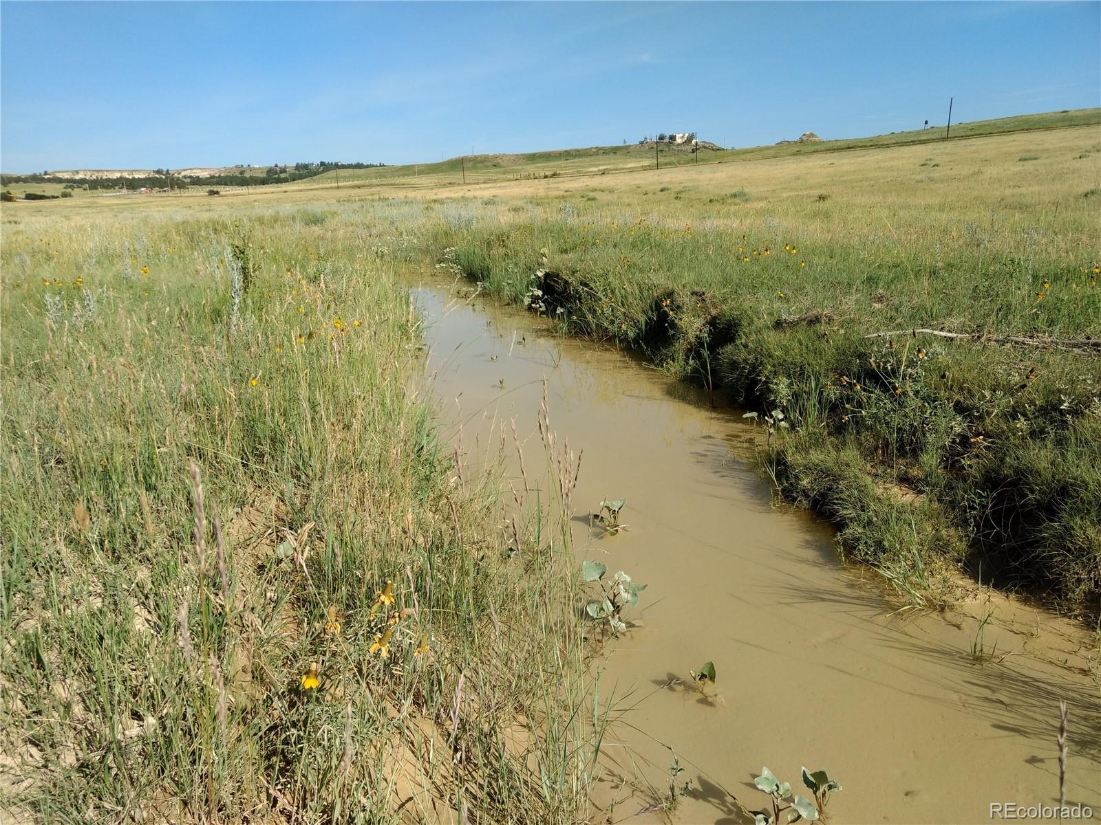 Lot 1 Fiddleback Ranch Road Kiowa, CO 80117 - Photo 4 of 34 a view of an ocean and beach