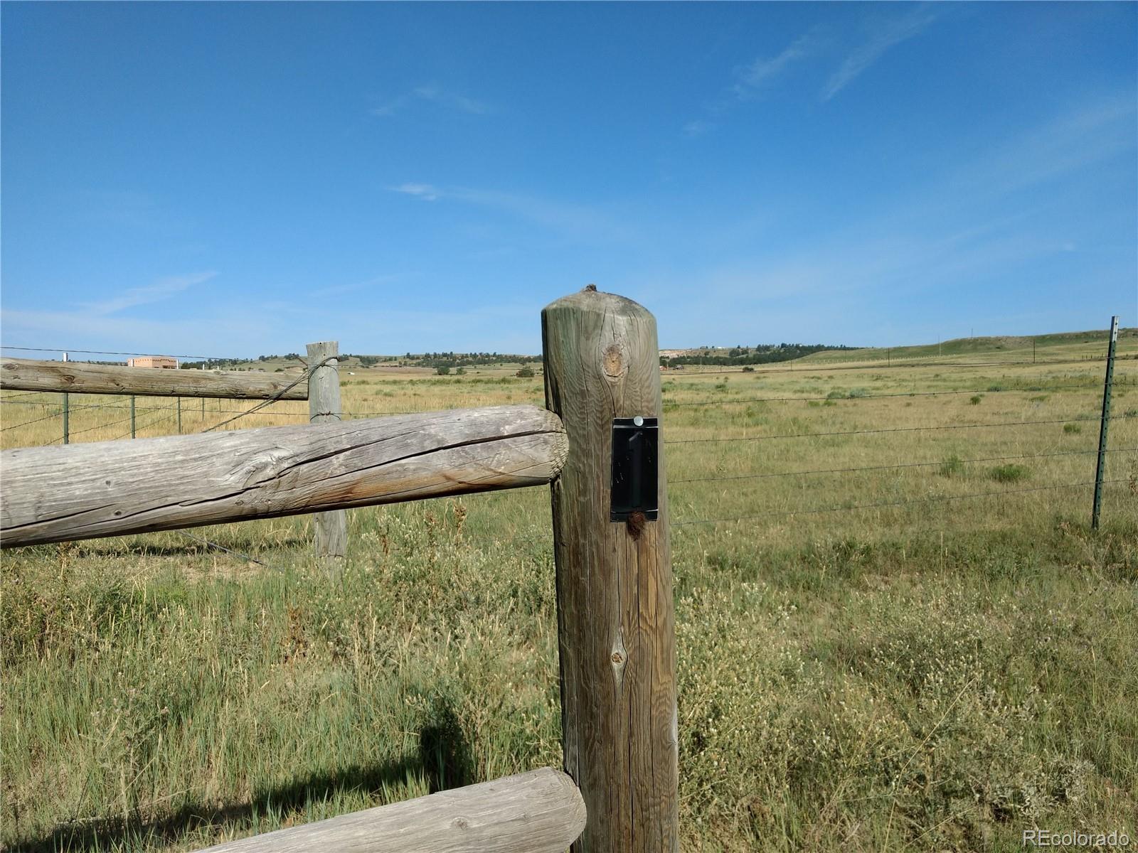 Lot 1 Fiddleback Ranch Road Kiowa, CO 80117 - Photo 9 of 34 a view of a balcony next to a yard