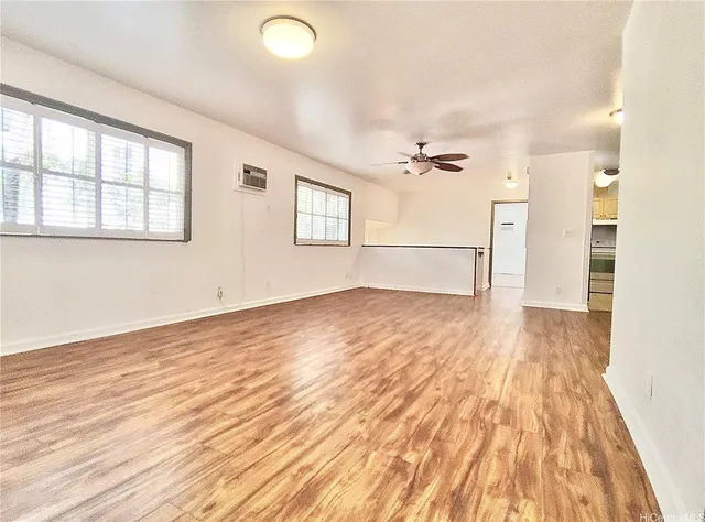 a kitchen with a refrigerator sink and stove