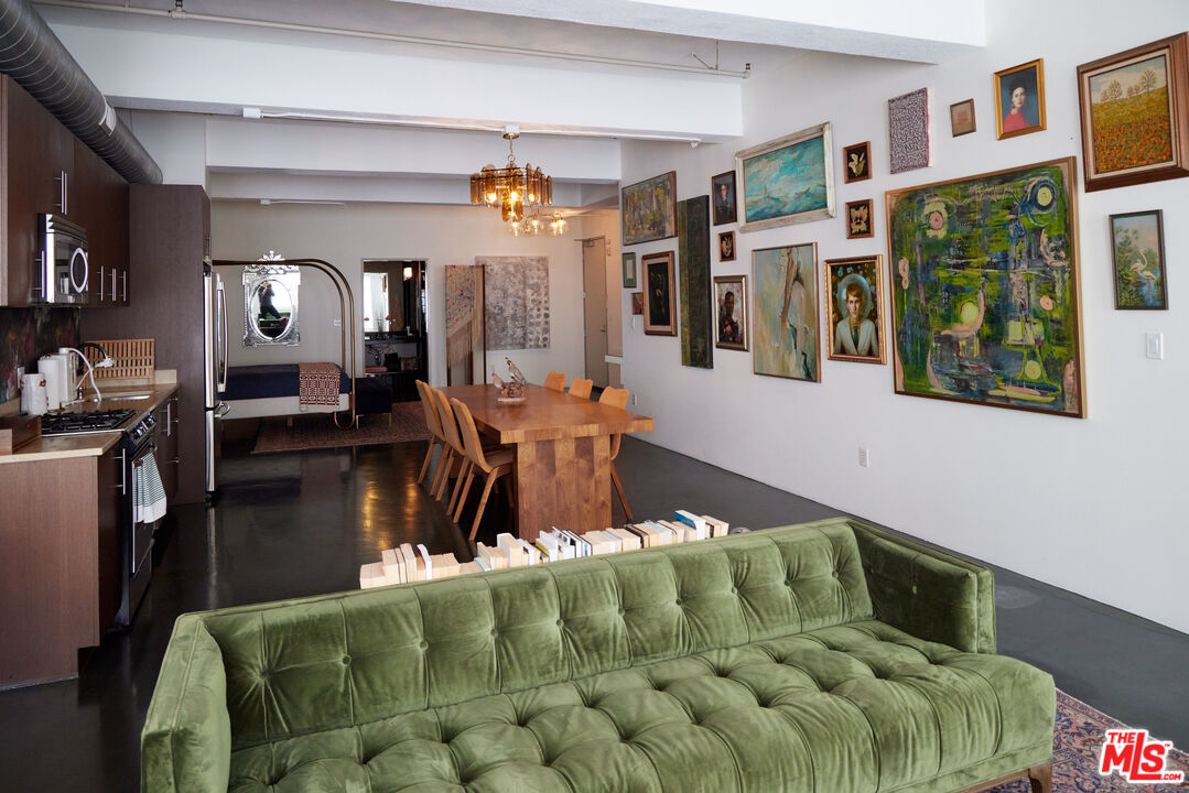 849 South Broadway, Unit 906 Los Angeles, CA 90014 - Photo 13 of 65 a living room with fireplace furniture and decor