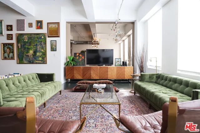 a view of living room and dining room