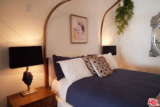 a view of a swimming pool with outdoor seating