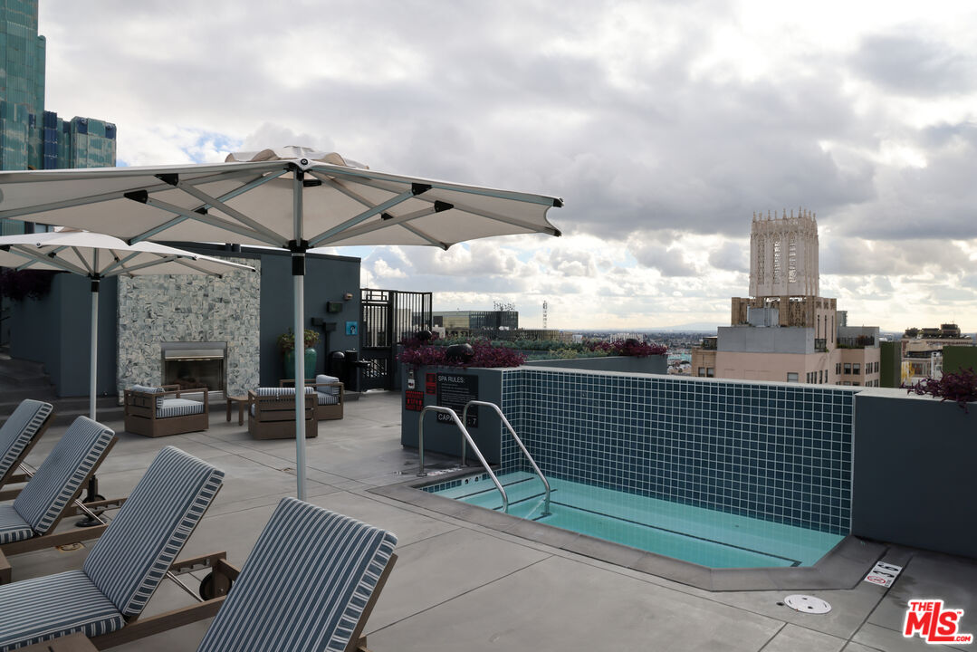 849 South Broadway, Unit 906 Los Angeles, CA 90014 - Photo 50 of 65 a view of a terrace with furniture