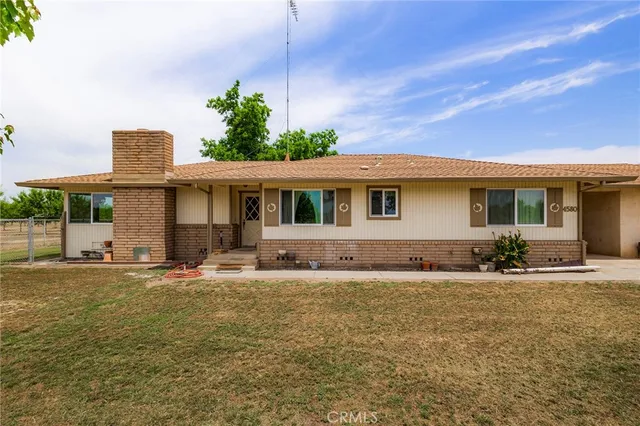a large living room with a large window