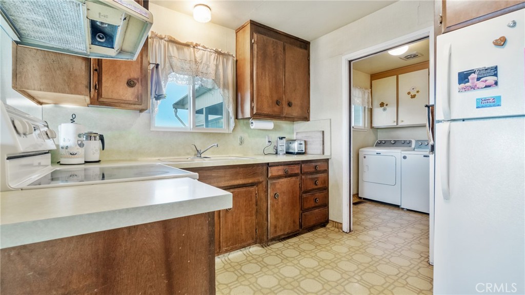 4580 Dayton West Road Chico, CA 95928 - Photo 20 of 75 a kitchen with a sink cabinets and window