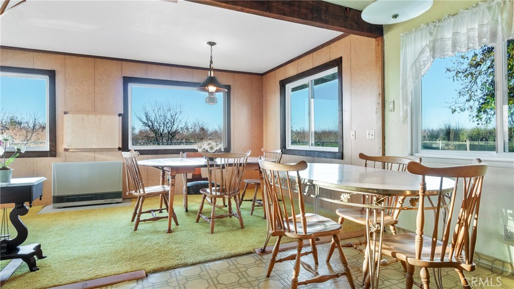 4580 Dayton West Road Chico, CA 95928 - Photo 21 of 75 a view of a dining room with furniture window and outside view