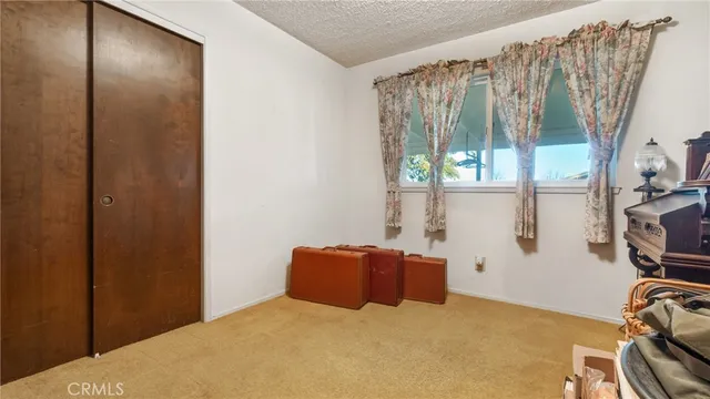 a kitchen with a stove and a refrigerator