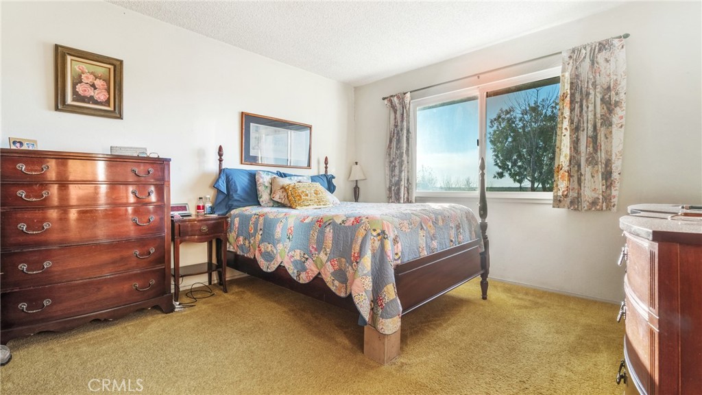 4580 Dayton West Road Chico, CA 95928 - Photo 27 of 75 a bedroom with a bed and a window