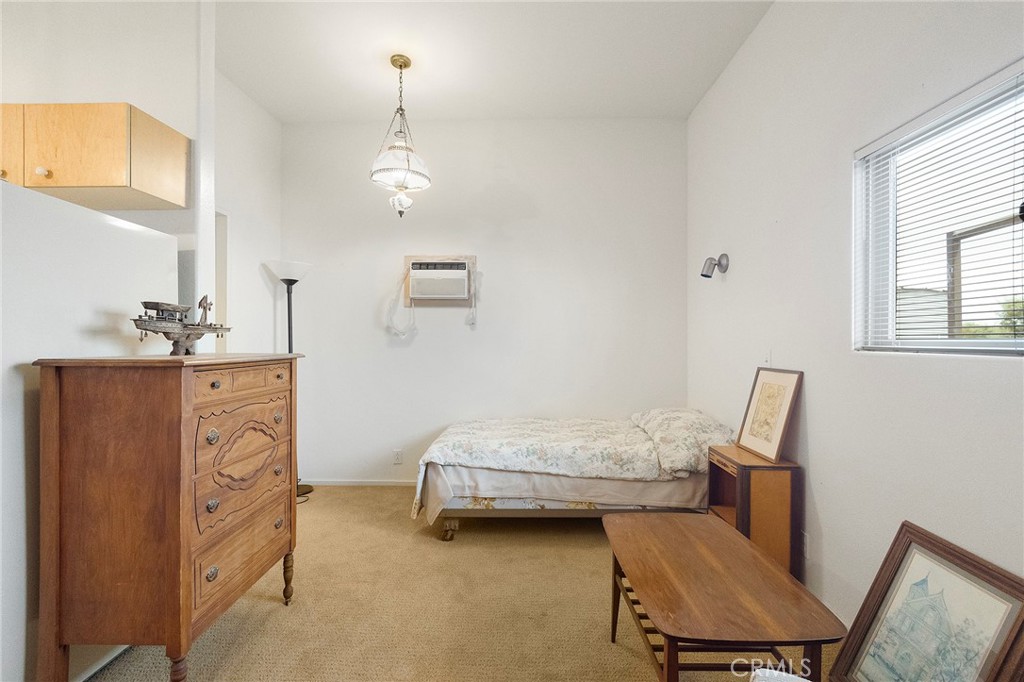 4580 Dayton West Road Chico, CA 95928 - Photo 34 of 75 a bedroom with a bed a table and chair