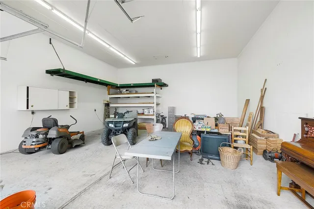 a view of outdoor space with green field and trees