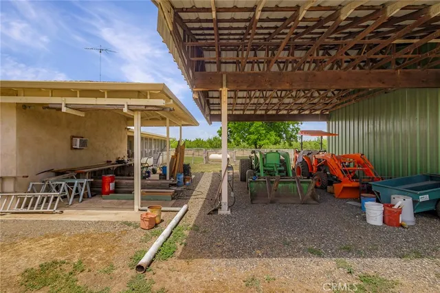 an aerial view of a house with a lake view
