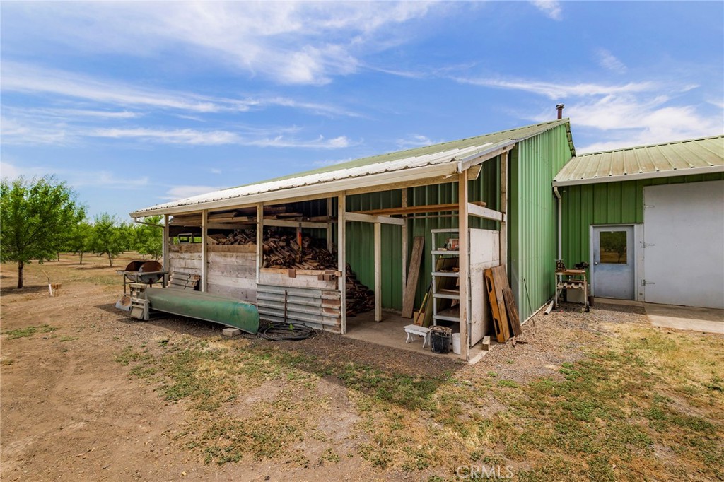 4580 Dayton West Road Chico, CA 95928 - Photo 44 of 75 a view of a house with a balcony and floor to ceiling window