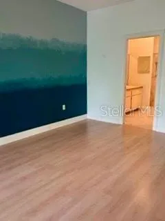 a view of an empty room and window