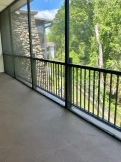 a view of a city street from a balcony