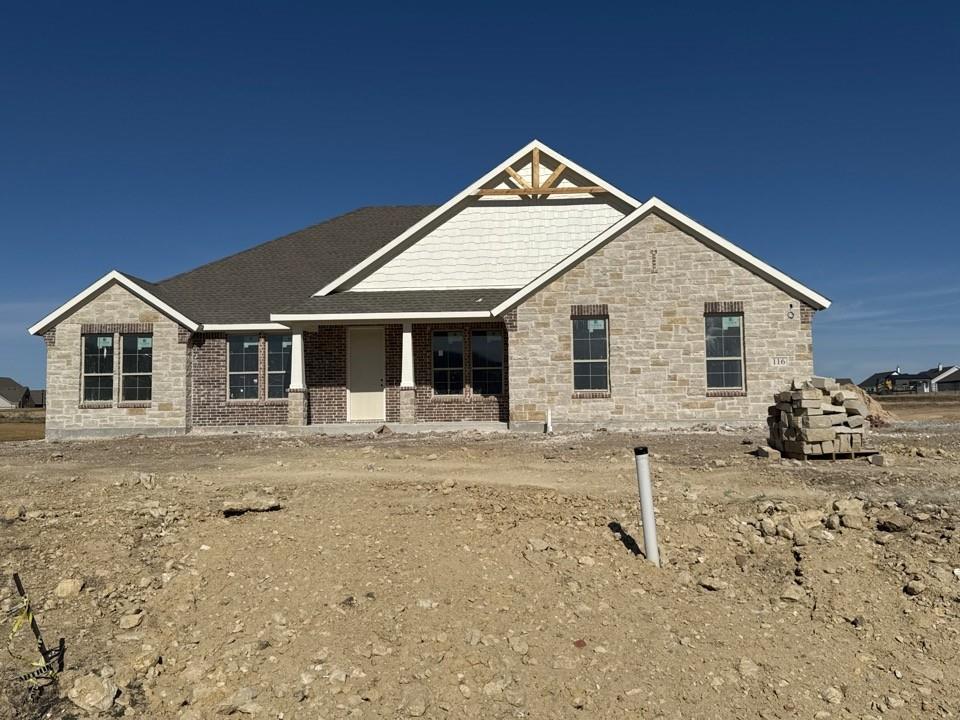 116 Snowy Owl Trail Rhome, TX 76078 - Photo 1 of 14 a view of a house with a yard
