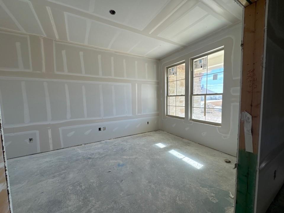 116 Snowy Owl Trail Rhome, TX 76078 - Photo 3 of 14 a view of an empty room with a window