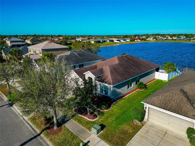 an aerial view of a house with a garden