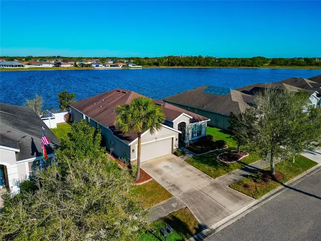 an aerial view of a house with a garden
