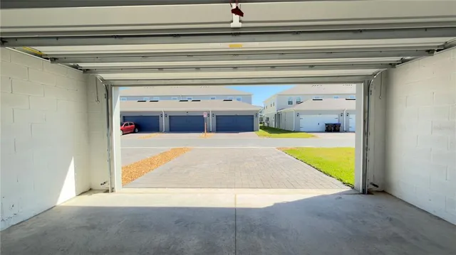 a view of garage and yard
