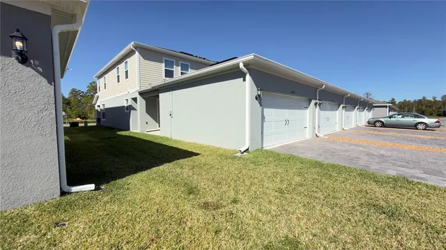 a view of park with large trees