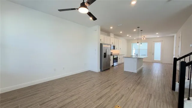 a view of kitchen with wooden floor