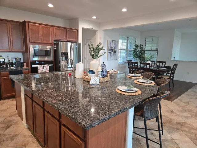 a aerial view of a house with a yard