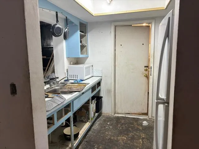 a kitchen with stainless steel appliances granite countertop a stove and a refrigerator