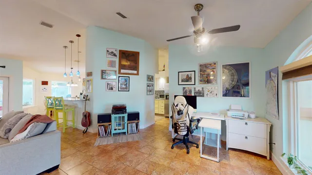 a kitchen with stainless steel appliances granite countertop a sink and a stove